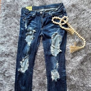 Distressed ripped jeans